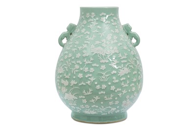 Lot 488 - A LARGE CHINESE SLIP-DECORATED CELADON VASE, HU