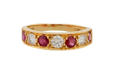 Lot 21 - A RUBY AND DIAMOND SEVEN-STONE RING, CIRCA 1982