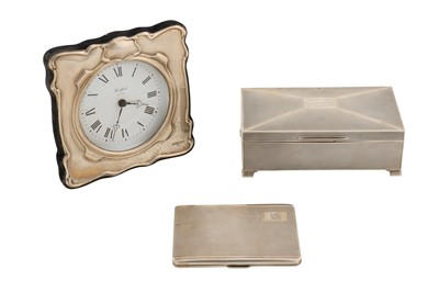 Lot 102 - A George V sterling silver cigarette box, Birmingham 1935 by Walker and Hall