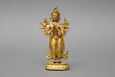 Lot 178 - A SINO-TIBETAN GILT-BRONZE FIGURE OF MAITREYA