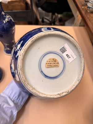 Lot 467 - A CHINESE BLUE AND WHITE 'PRUNUS' JAR AND TWO VASES