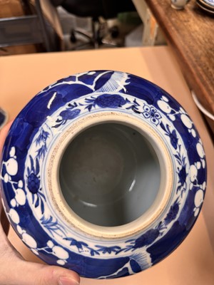 Lot 467 - A CHINESE BLUE AND WHITE 'PRUNUS' JAR AND TWO VASES