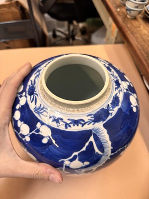 Lot 467 - A CHINESE BLUE AND WHITE 'PRUNUS' JAR AND TWO VASES