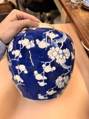 Lot 467 - A CHINESE BLUE AND WHITE 'PRUNUS' JAR AND TWO VASES