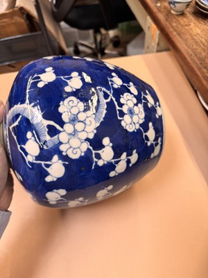 Lot 467 - A CHINESE BLUE AND WHITE 'PRUNUS' JAR AND TWO VASES