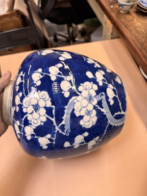 Lot 467 - A CHINESE BLUE AND WHITE 'PRUNUS' JAR AND TWO VASES