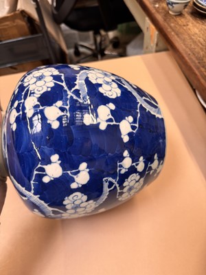Lot 467 - A CHINESE BLUE AND WHITE 'PRUNUS' JAR AND TWO VASES