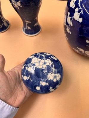 Lot 467 - A CHINESE BLUE AND WHITE 'PRUNUS' JAR AND TWO VASES