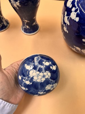 Lot 467 - A CHINESE BLUE AND WHITE 'PRUNUS' JAR AND TWO VASES