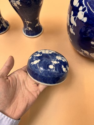 Lot 467 - A CHINESE BLUE AND WHITE 'PRUNUS' JAR AND TWO VASES