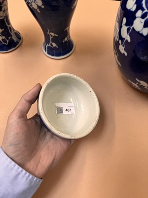 Lot 467 - A CHINESE BLUE AND WHITE 'PRUNUS' JAR AND TWO VASES