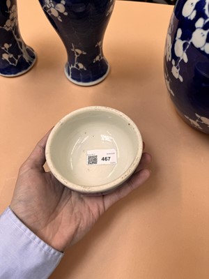 Lot 467 - A CHINESE BLUE AND WHITE 'PRUNUS' JAR AND TWO VASES