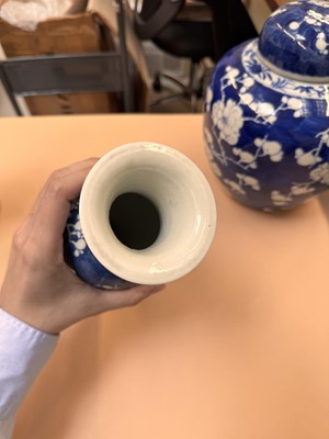 Lot 467 - A CHINESE BLUE AND WHITE 'PRUNUS' JAR AND TWO VASES