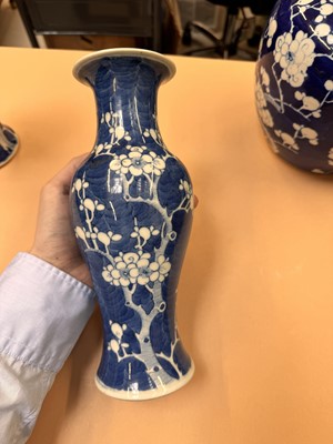 Lot 467 - A CHINESE BLUE AND WHITE 'PRUNUS' JAR AND TWO VASES