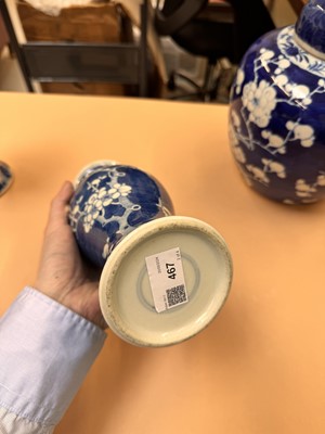 Lot 467 - A CHINESE BLUE AND WHITE 'PRUNUS' JAR AND TWO VASES