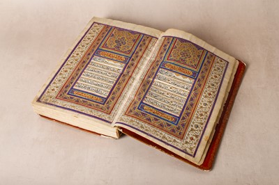 Lot 22 - AN IMPRESSIVE MID-19TH CENTURY PERSIAN ILLUMINATED QAJAR QUR’AN, DATED 1286AH (1869AD)