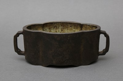 Lot 679 - A CHINESE BRONZE LOBED TWO-HANDLED CENSER, SHIJIA GUZHI MARK