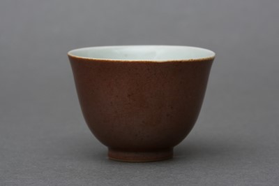 Lot 45 - A RARE CHINESE MONOCHROME BROWN-GLAZED WINE CUP