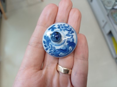 Lot 424 - A SMALL CHINESE BLUE AND WHITE TEAPOT AND COVER