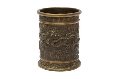 Lot 674 - A CHINESE BRONZE 'DRAGON' BRUSH POT, BITONG