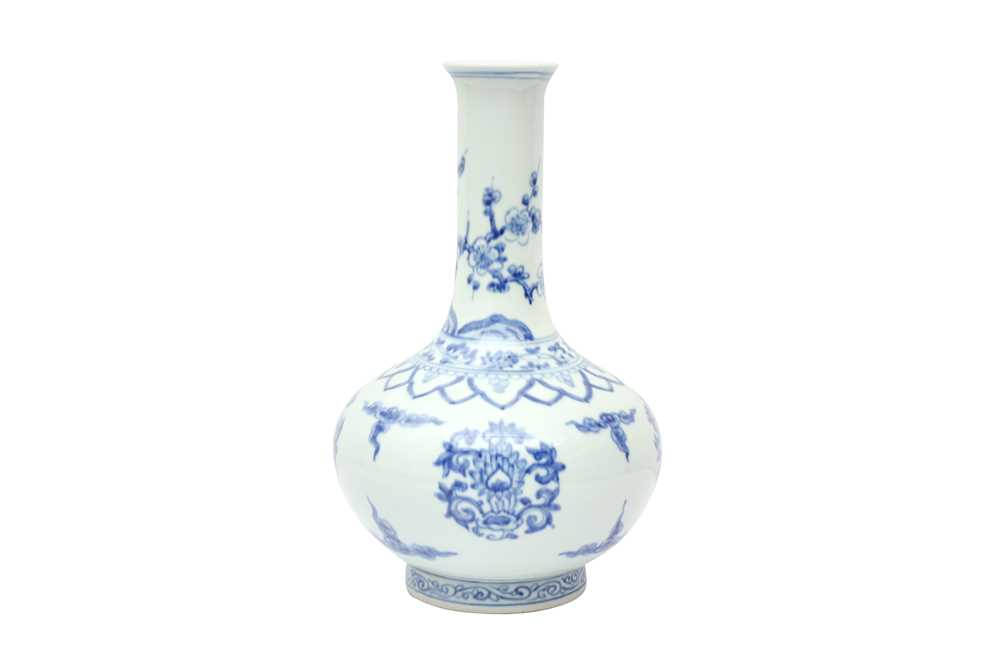 Lot 468 - A CHINESE BLUE AND WHITE 'LOTUS' BOTTLE VASE