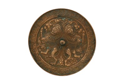 Lot 34 - A PERSIAN SELJUK BRONZE MIRROR