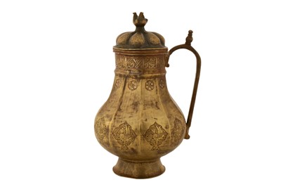 Lot 71 - A 12TH CENTURY PERSIAN SELJUQ JUG WITH SILVER AND COPPER INLAY DEPICTING BIRDS