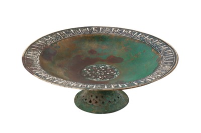 Lot 32 - A PERSIAN SELJUK SILVER INLAID BRONZE FOOTED PLATE OR 'TAZA'
