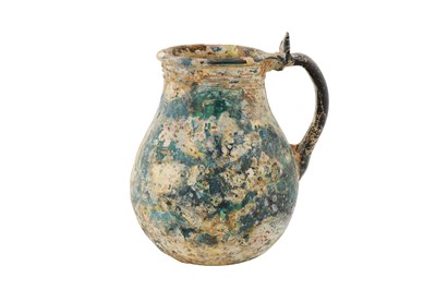Lot 37 - AN EARLY 10TH -12TH CENTURY IRIDESCENT GLASS VESSEL