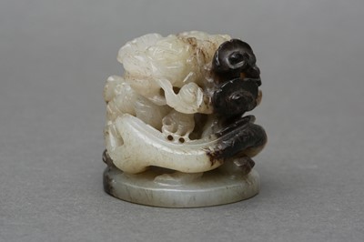 Lot 531 - A CHINESE GREY AND BLACK JADE 'DRAGON AND LINGZHI' CARVING