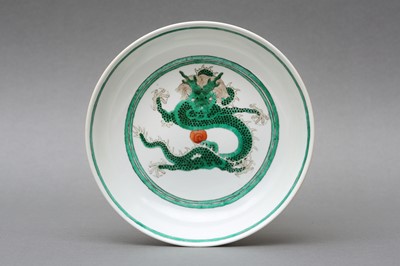 Lot 247 - A CHINESE GREEN-ENAMELLED 'DRAGONS' DISH