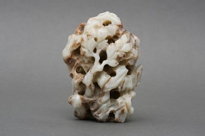Lot 530 - A CHINESE CARVED 'DRAGON AMONG MOUNTAINS' JADE