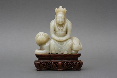 Lot 532 - A CHINESE CELADON JADE CARVING OF BUDDHA
