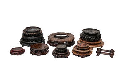 Lot 595 - FOURTEEN CHINESE WOOD STANDS