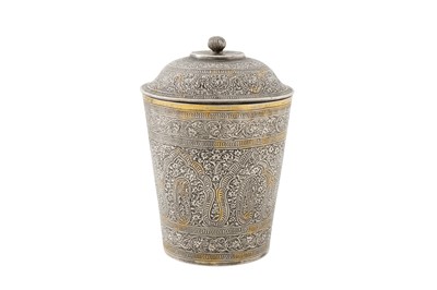 Lot 105 - A mid to late 19th century Anglo – Indian unmarked parcel gilt silver covered beaker, Kashmir circa 1870
