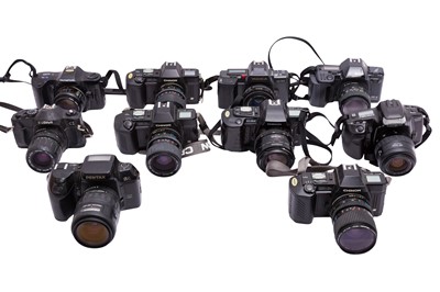 Lot 42 - A Box of Manual and AF Film Cameras