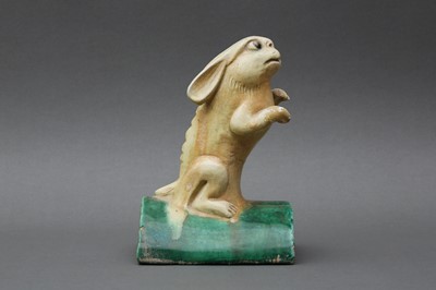 Lot 18 - A CHINESE SANCAI-GLAZED 'RABBIT' ROOF TILE