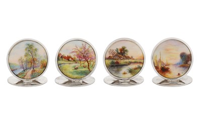 Lot 20 - A cased set of four George V sterling silver and enamel place card or menu holders, Birmingham 1928 by Adie Bros