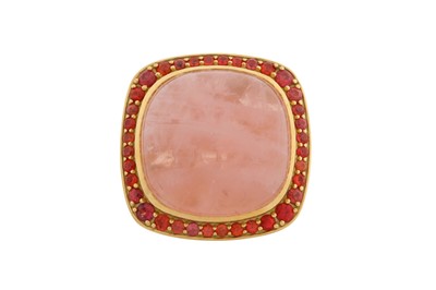 Lot 98 - A ROSE QUARTZ AND ORANGE SAPPHIRE RING
