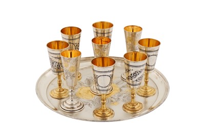 Lot 328 - A mid- 20th century Russian 875 standard parcel gilt silver vodka cup set, Moscow 1927-58