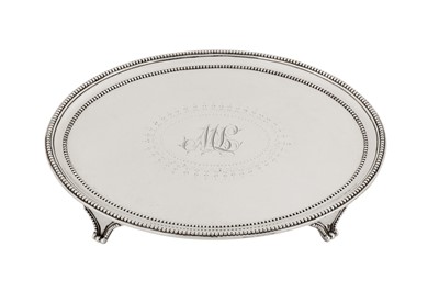 Lot 523 - A George III sterling silver salver, London 1784 by Elizabeth Jones (reg. 15th Jan 1783)