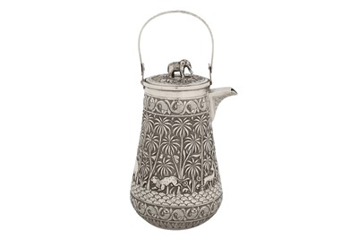 Lot 119 - A late 19th century Anglo – Indian unmarked silver hot water or coffee pot, Lucknow circa 1895