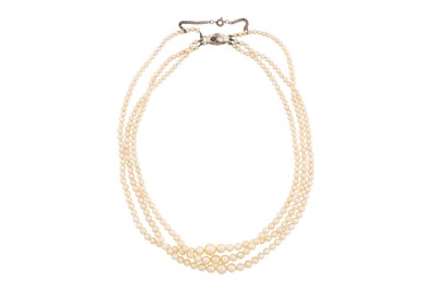 Lot 34 - A THREE-STRAND CULTURED PEARL NECKLACE