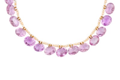 Lot 83 - AN AMETHYST AND SEED PEARL FRINGE NECKLACE