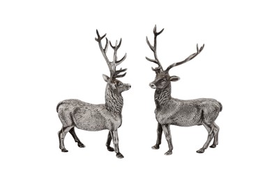 Lot 170 - A pair of Elizabeth II sterling silver models of stags, London 1995 by Edward Barnard