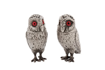 Lot 41 - A cased pair of Victorian sterling silver novelty pepper pots, London 1867 by Richards and Brown