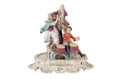 Lot 187 - A MEISSEN PORCELAIN FIGURAL GROUP ON STAND, MID 18TH CENTURY