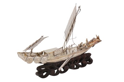 Lot 256 - A 20th century Chinese export unmarked silver model of a Junk boat