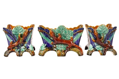 Lot 216 - A SET OF THREE MAJOLICA PLANTERS