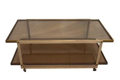 Lot 307 - A SMOKED GLASS COFFEE TABLE